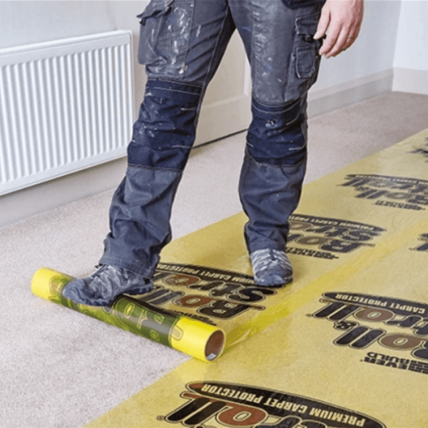 Residential use of Roll and Stroll Carpet Protector during a family gathering.